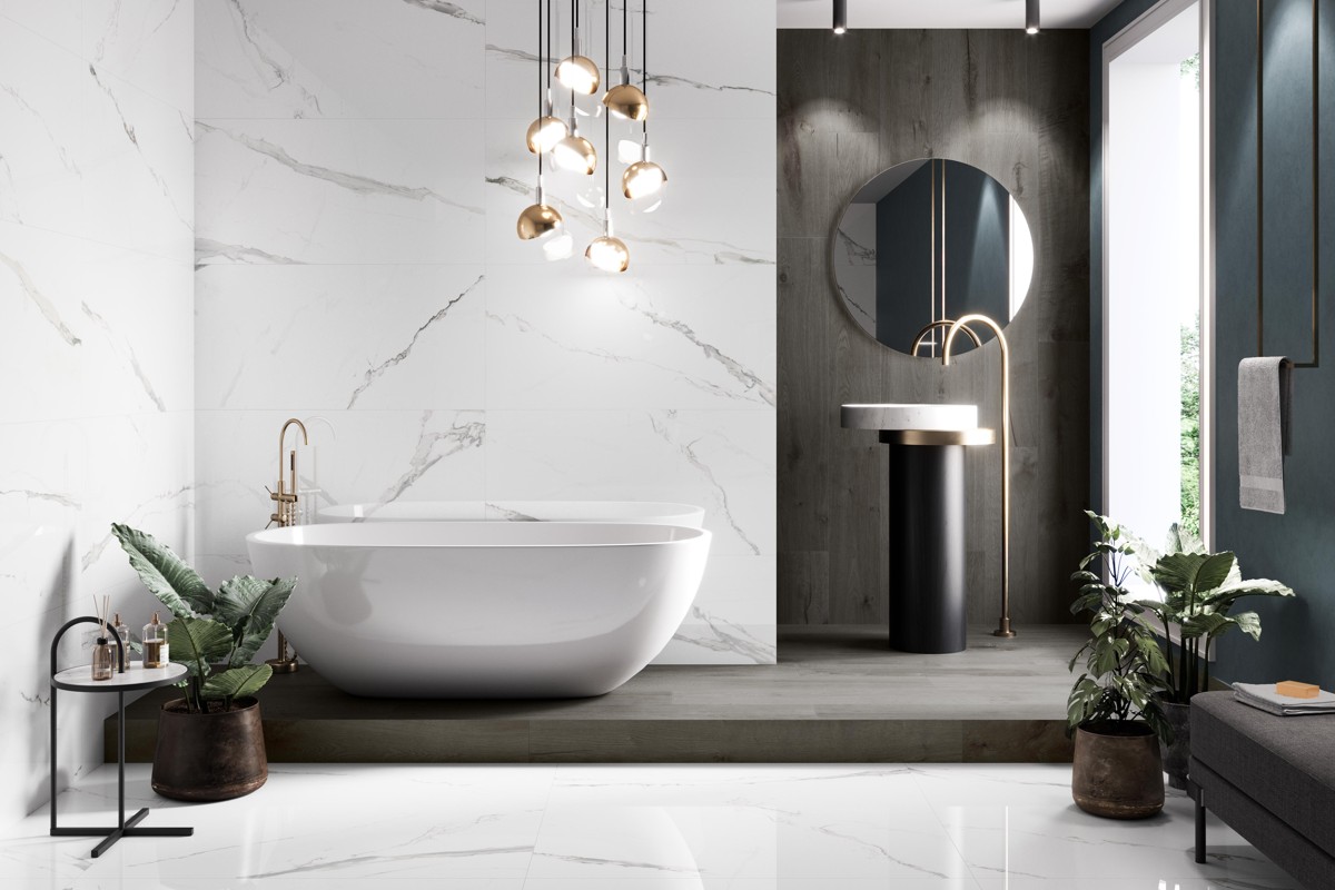 Pamesa Cellini bathroom with white veined surfaces, dark accents and a freestanding bath.